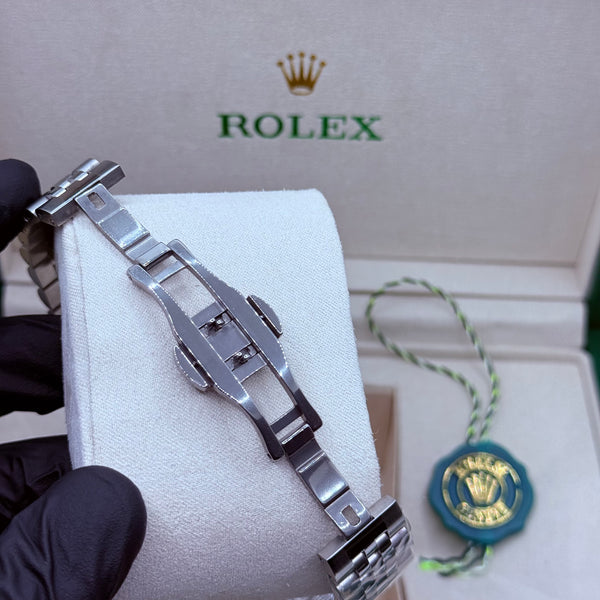 Rolex automatic movement silver with green dial